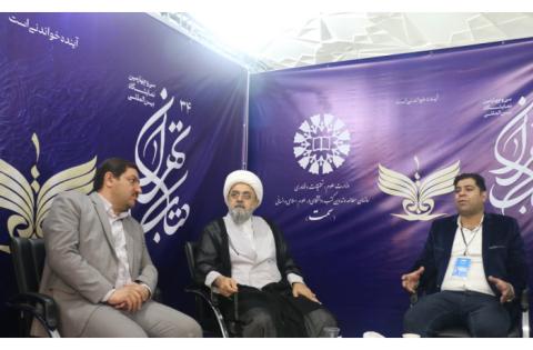 بازدید دکتر شهریاری از غرفه «سازمان مطالعه و تدوین» — تصویر 2
